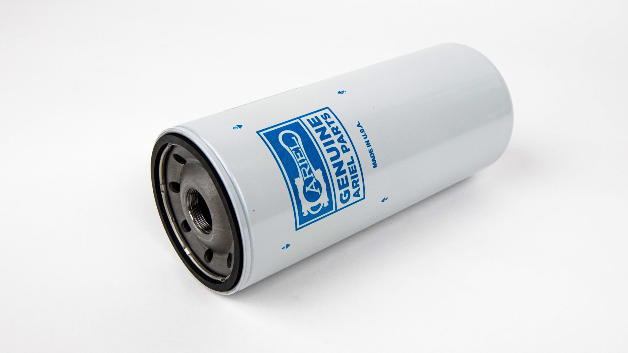 An ariel spin-on oil filter on a white background