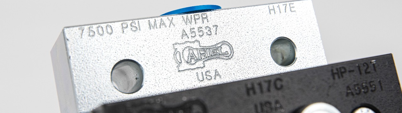 Detail of the Ariel logo on one of the lubrication distribution blocks